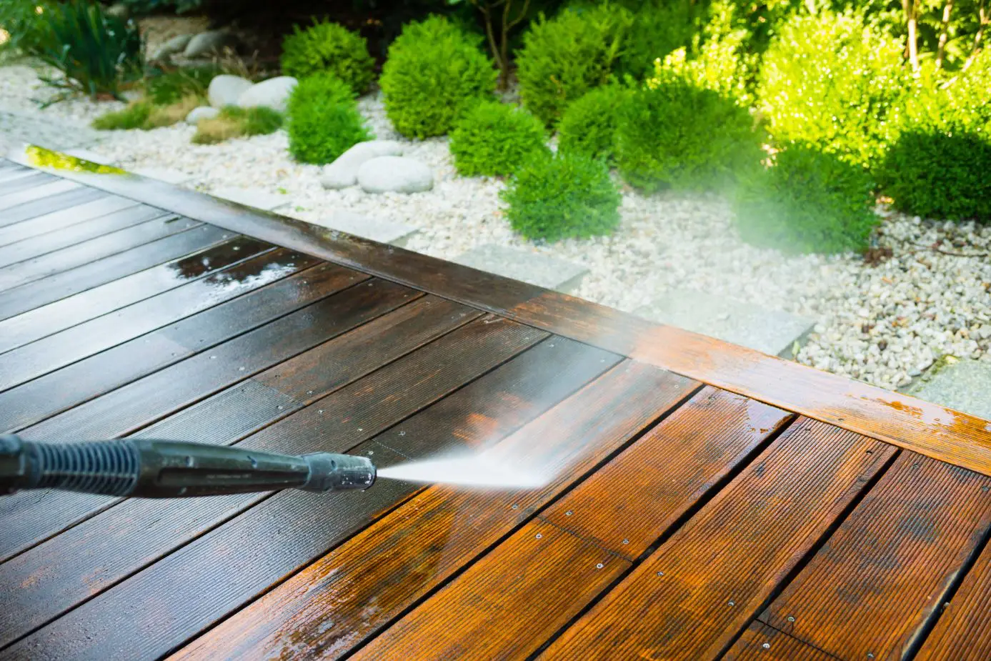 Black gerni pressure washing a patio