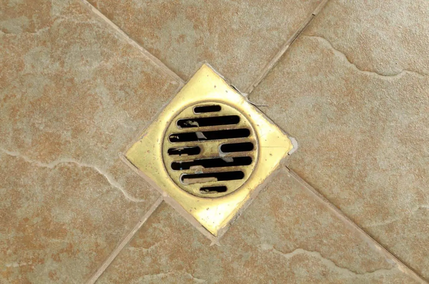 dirty chrome shower drain