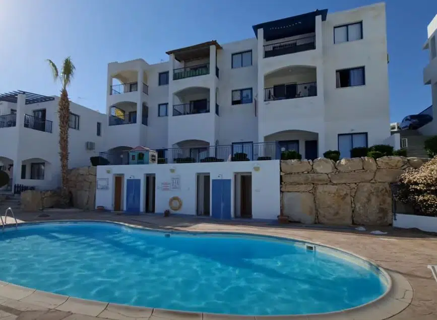 large shared apartment complex with small pool