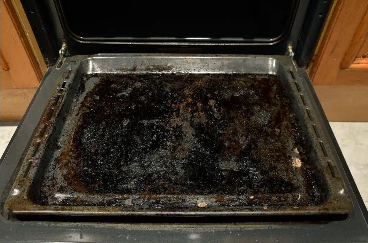 top view of a dirty oven tray